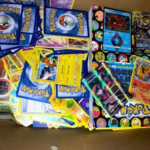 Pokémon cards have 500 plus with a book and a couple stickers of Pokémon